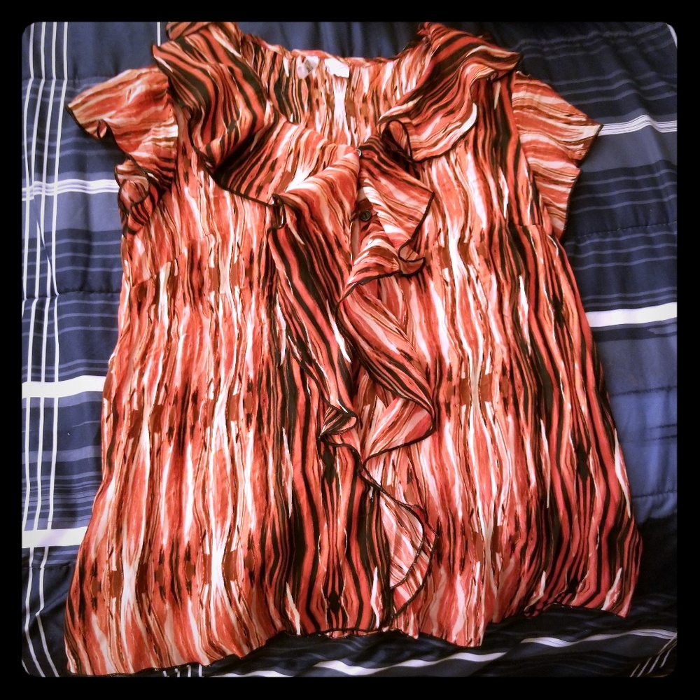 Pretty reds/oranges/black and white top